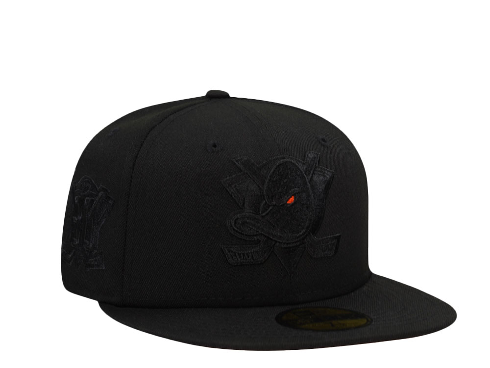New Era Anaheim Ducks 30th Anniversary Blackout Orange Laser Prime Edition 59Fifty Fitted Cap